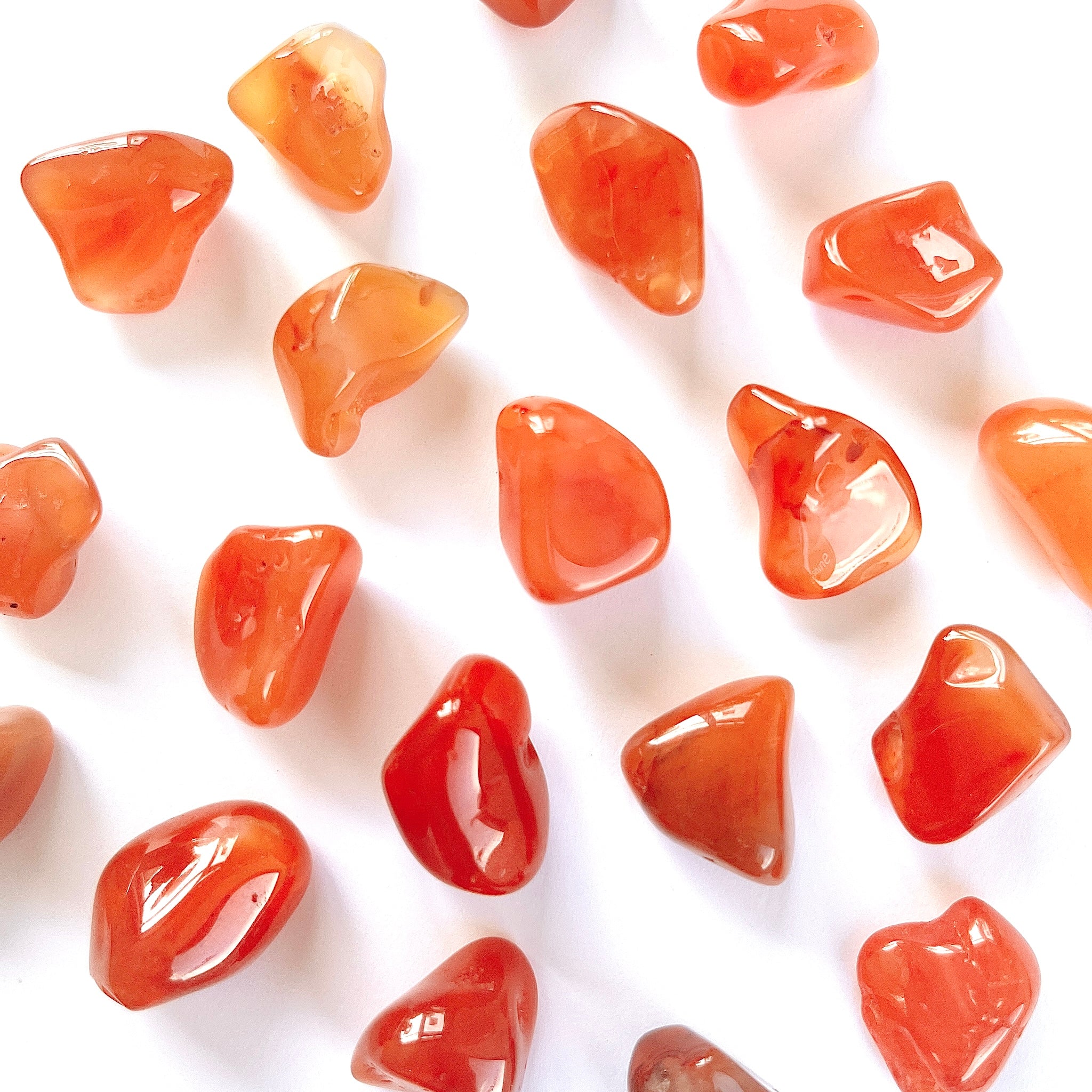 Trumlade kristaller i röda/orange Karneol 
