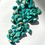 Amazonit ljusblå trumlade kristaller