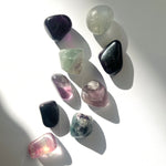 Regnbågsfluorit Trumlade Kristaller